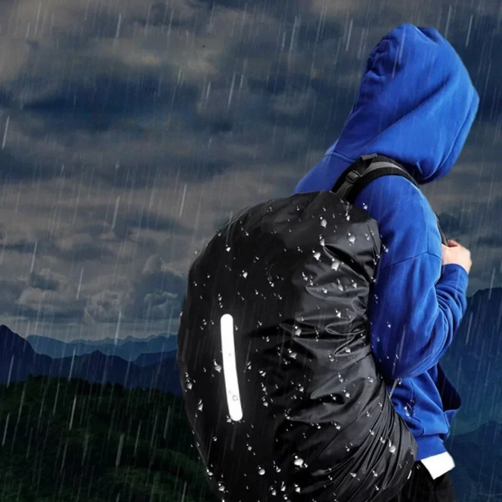 High-visibility reflective waterproof backpack cover, a must-have for safe cycling & trekking in rain.