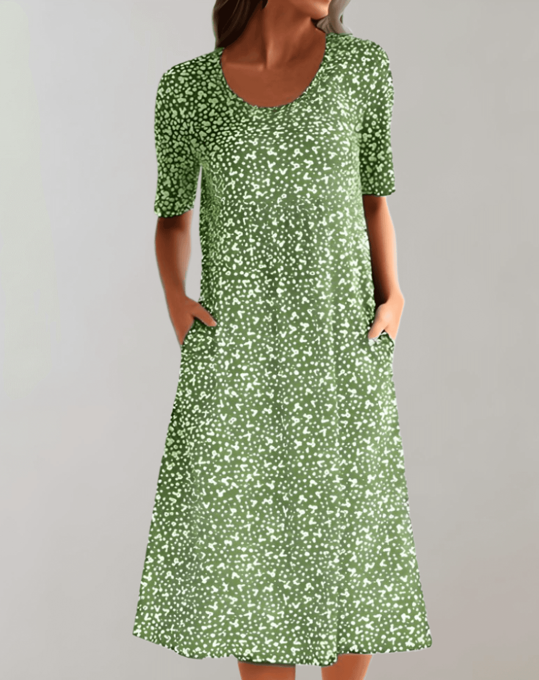Lightweight women's V-neck summer dress. Flowy midi length for casual or elegant wear.