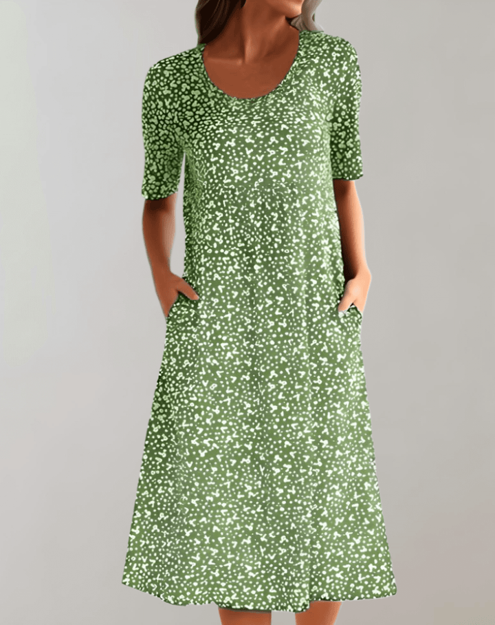 Lightweight women's V-neck summer dress. Flowy midi length for casual or elegant wear.