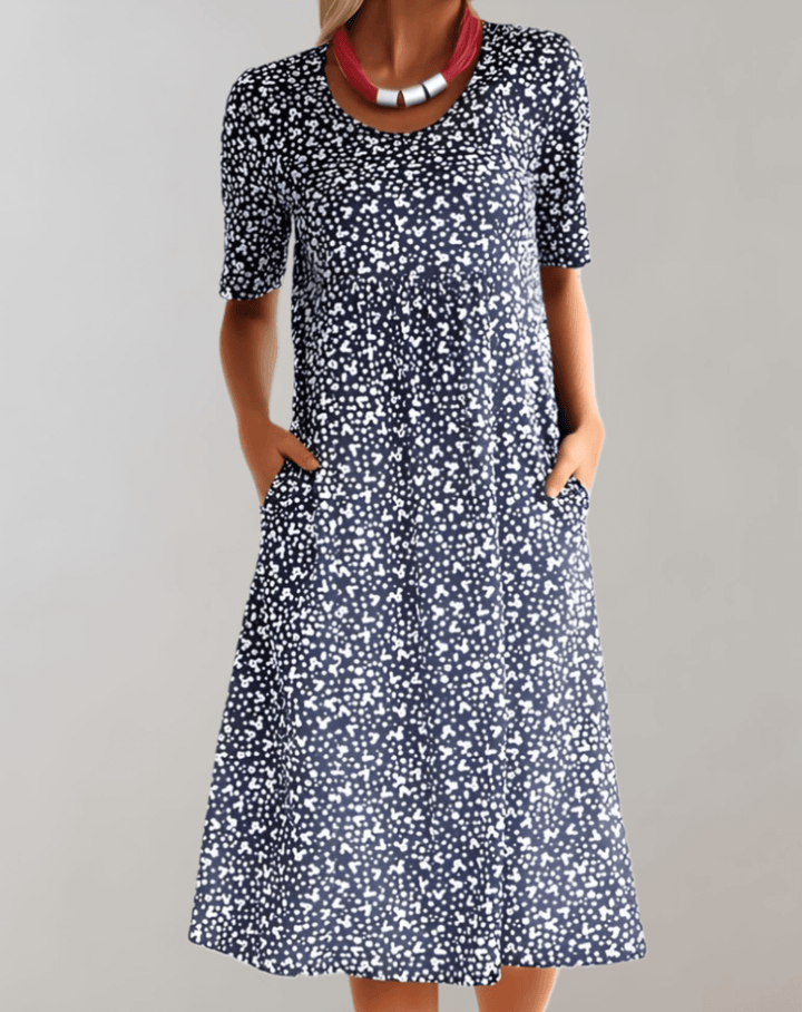 Elegant flowy V-neck summer dress for women. Versatile for casual outings or special events.