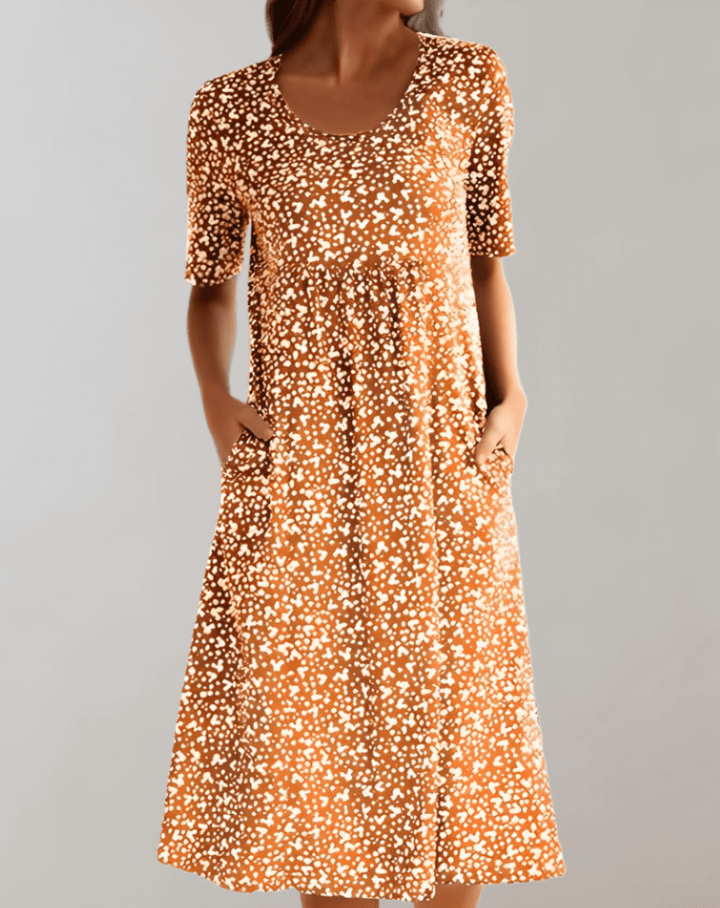 Soft, breathable V-neck summer midi dress for women. Offers comfortable, relaxed style.