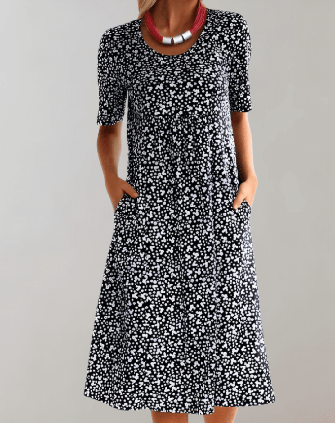 Sleeveless V-neck summer dress for women, offering an elegant, flowy, and comfortable look.