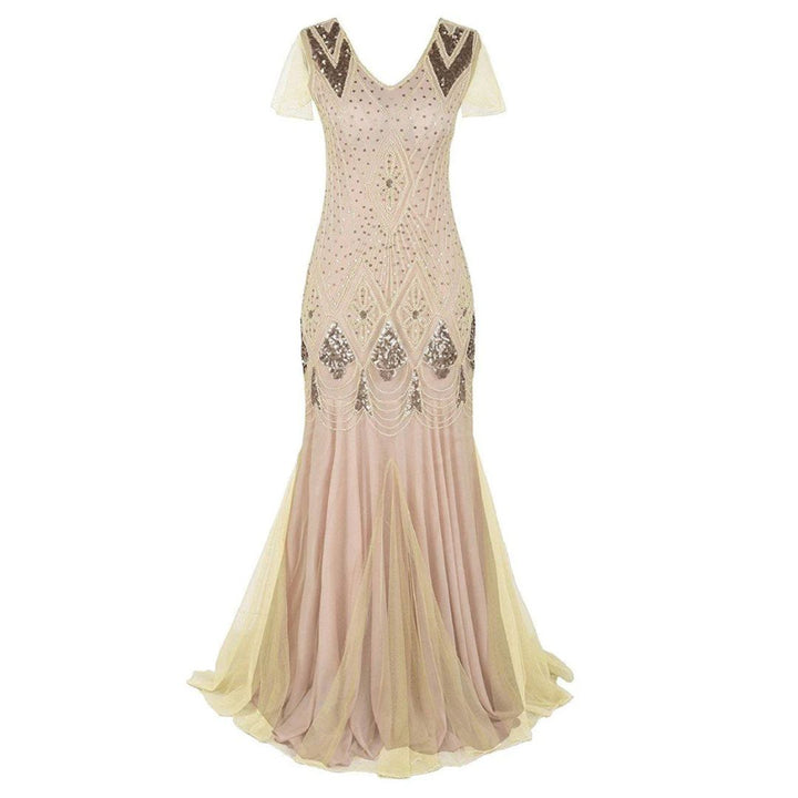 Dazzling long flapper dress with sequins & fringe, a stunning vintage women's evening attire.