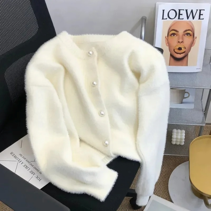 Comfortable women's loose knit round neck cardigan, ideal for effortless spring fashion and autumn layering.