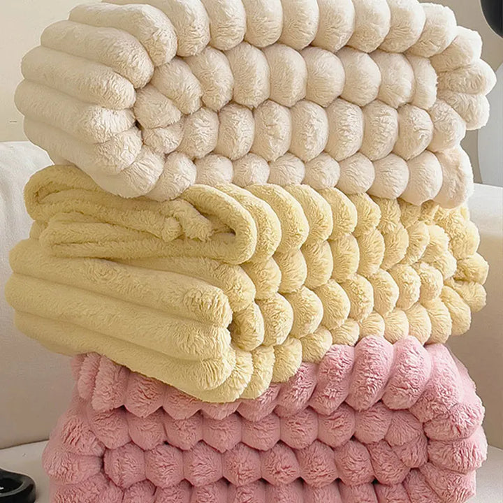 Enjoy ultimate relaxation with this warm, cozy comfort blanket, a luxurious soft throw for unwinding.