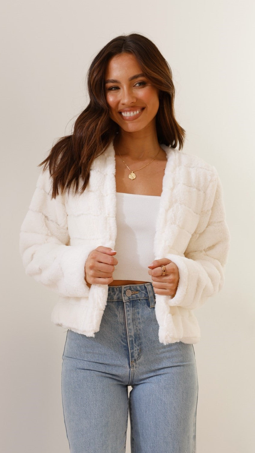 Luxe Veloura cropped jacket for women, offering effortless style & comfort.