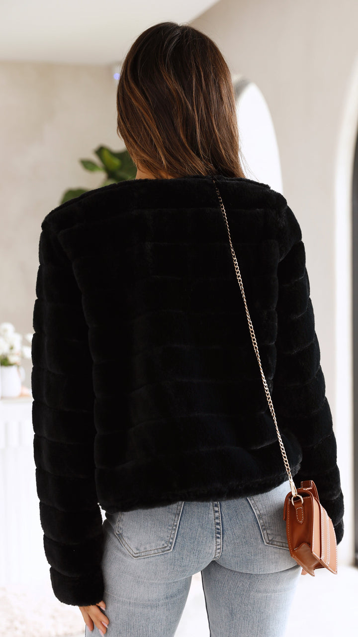Women's fashionable cropped veloura jacket, ideal for trendy outerwear.