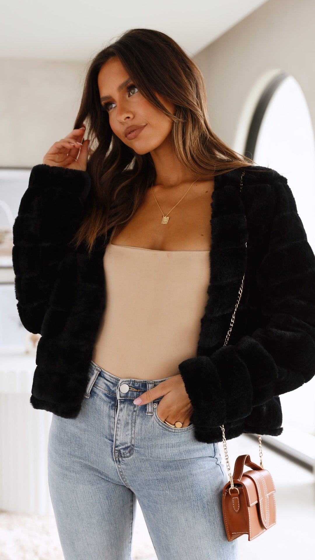 Elegant luxe veloura crop jacket for women, enhancing any casual or chic look.