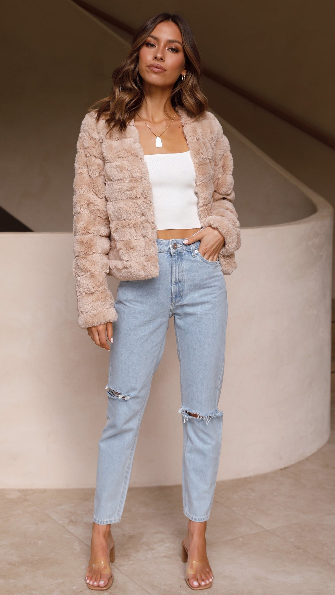 Chic women's veloura crop jacket, perfect for a sophisticated winter ensemble.