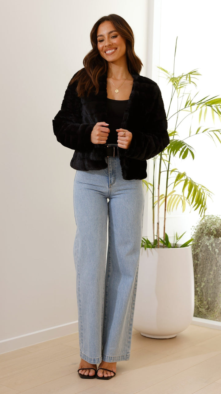 Stylish women's veloura crop jacket, offering a modern and trendy silhouette.
