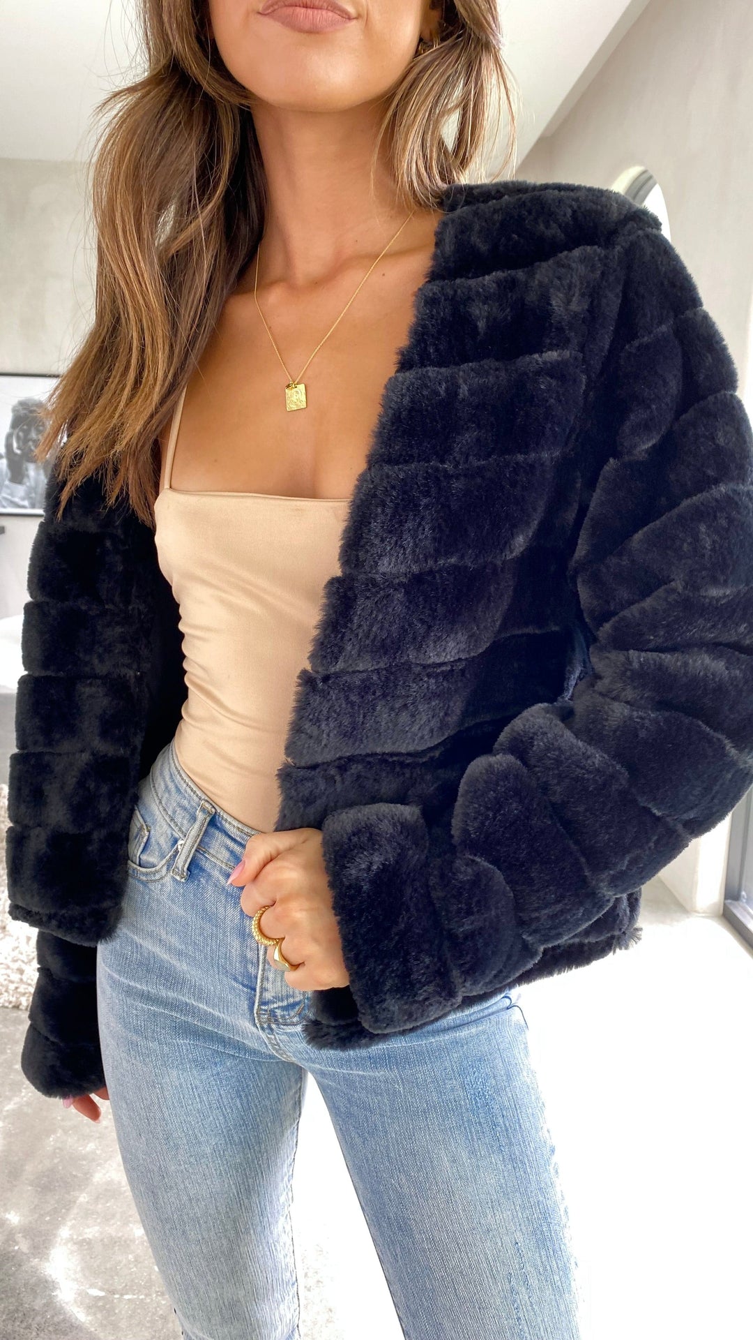 Trendy women's luxe cropped veloura jacket, a chic addition to any wardrobe.