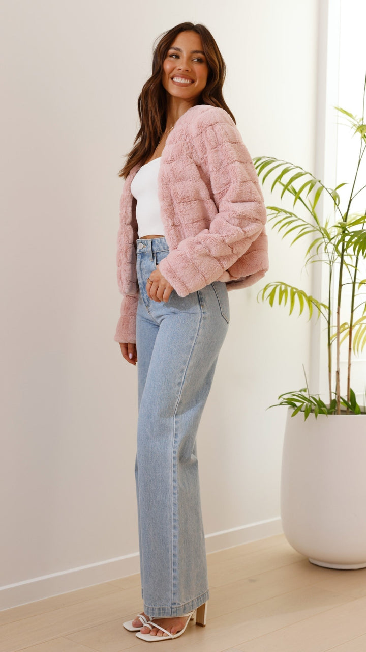 Statement piece: Women's trendy veloura cropped jacket for winter fashion.