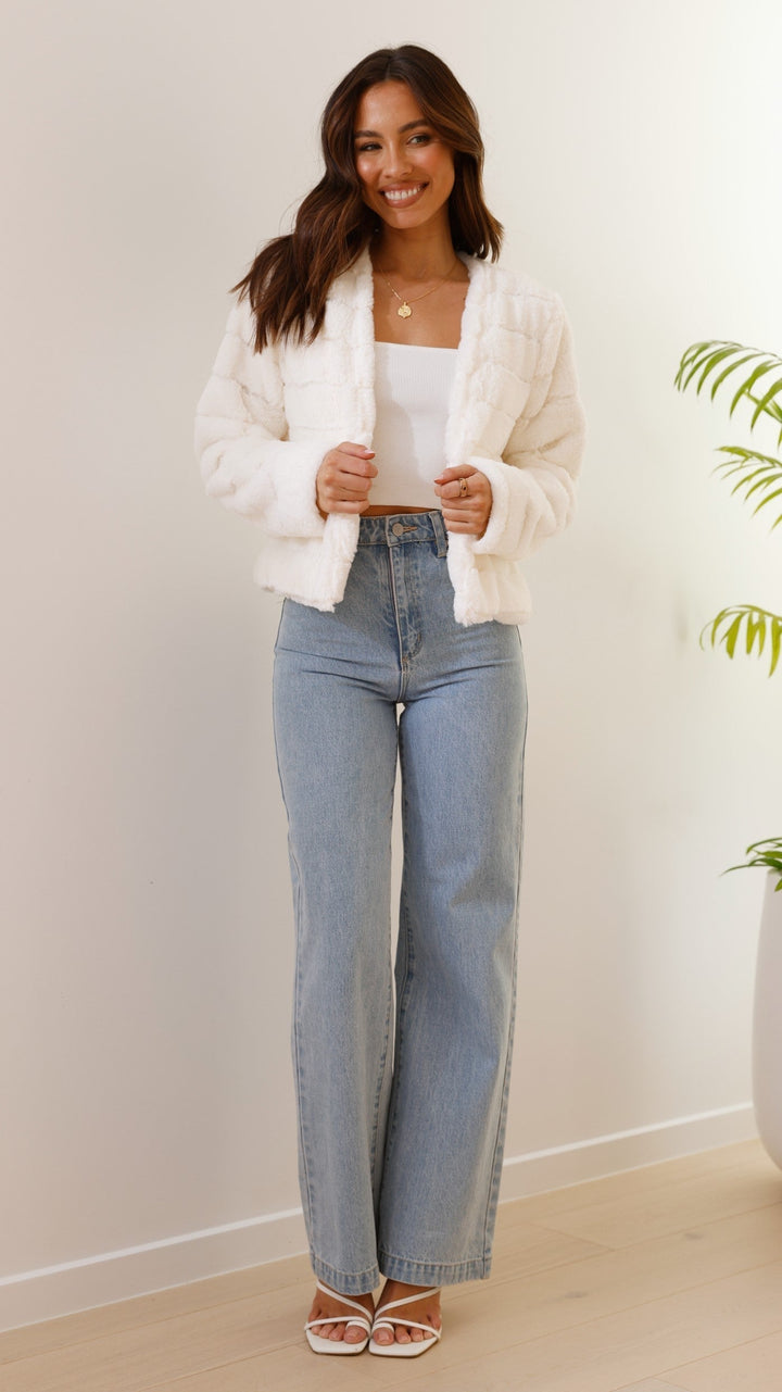 Plush veloura women's cropped jacket, combining luxury with effortless style.