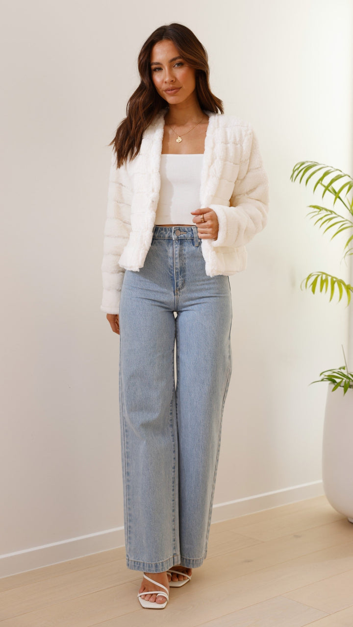 Fashion-forward women's veloura crop jacket, an elegant addition to any wardrobe.