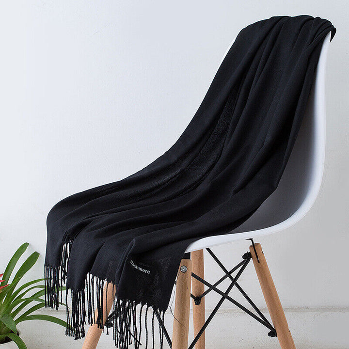 Luxurious Bria women's cashmere scarf, long, soft, and warm for elegant winter style.