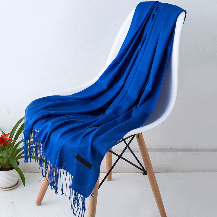 Indulgent soft long cashmere scarf for women, providing luxurious warmth and versatile style.