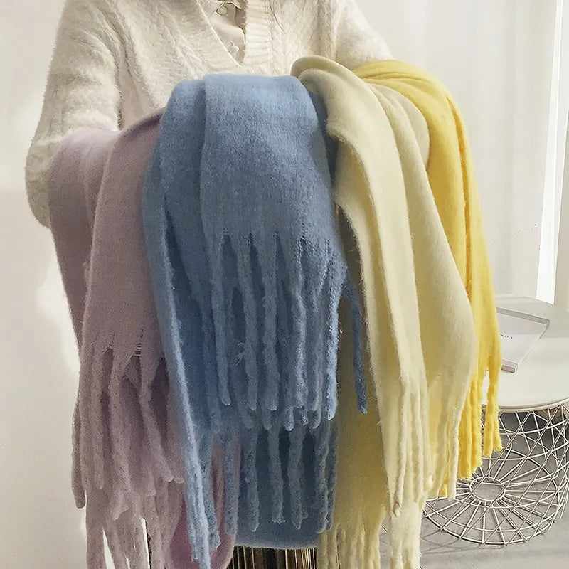 Chic women's cashmere scarf. Versatile and luxurious for elegant cold weather fashion.