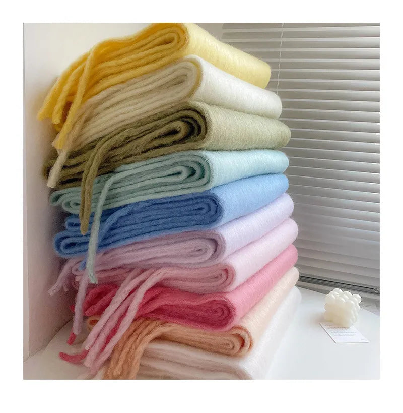 Classic plain cashmere scarf for women. A timeless and warm winter fashion staple.