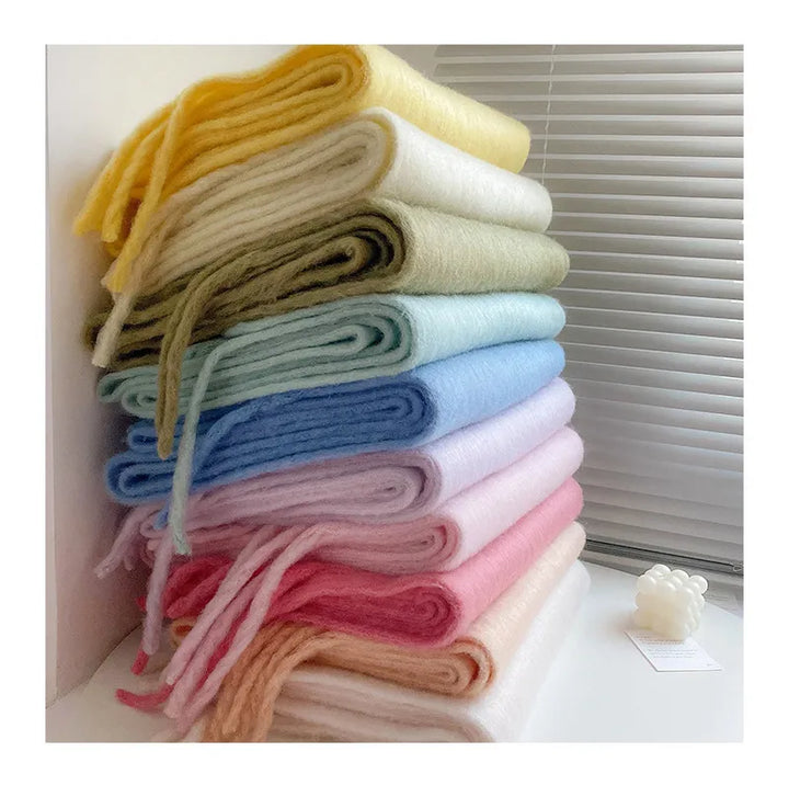 Classic plain cashmere scarf for women. A timeless and warm winter fashion staple.