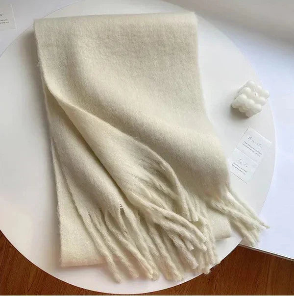 Stylish women's cashmere scarf, a must-have luxury accessory for winter comfort.