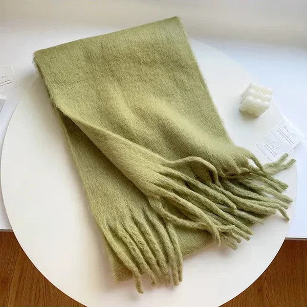 Luxurious women's cashmere scarf. Ideal for layering, warmth & sophisticated fashion.