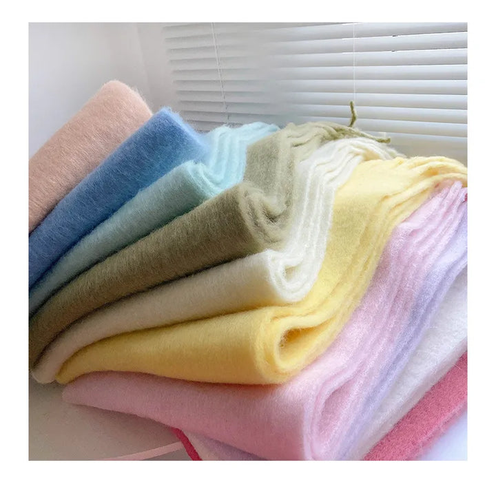 High-quality cashmere scarf for women. Essential warm accessory for cold winter days.