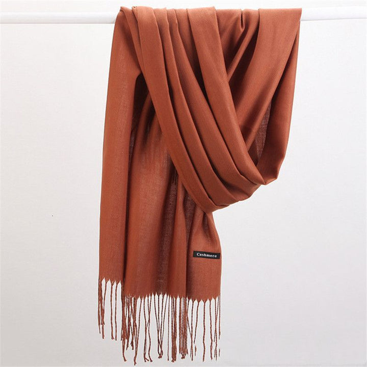Cozy women's Faith cashmere scarf, offering superior warmth and soft comfort.
