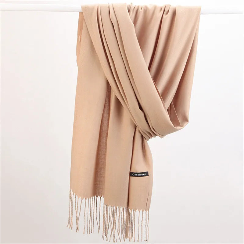 Sophisticated Faith cashmere scarf for women, a stylish accessory for any outfit.