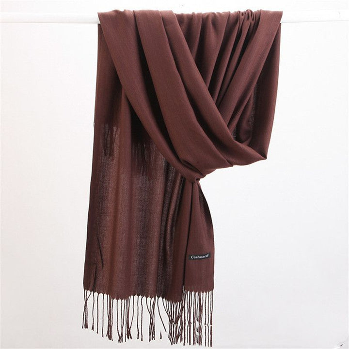 Deluxe women's cashmere scarf, a versatile cold weather accessory and luxury gift.