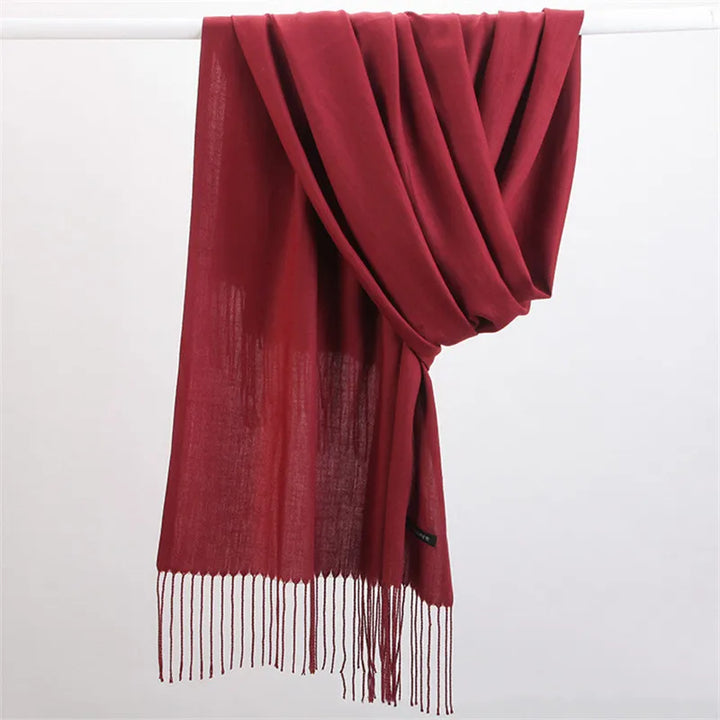 Premium women's cashmere scarf, ideal for luxurious winter fashion & cold weather.