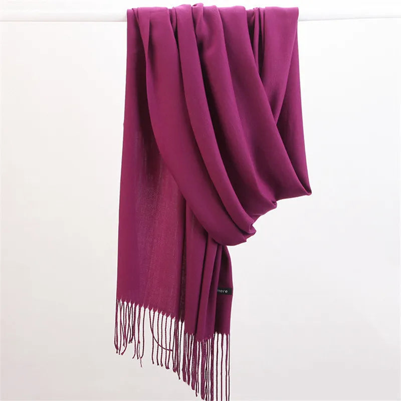 Versatile women's Faith cashmere scarf, a soft and warm accessory for stylish outfits.