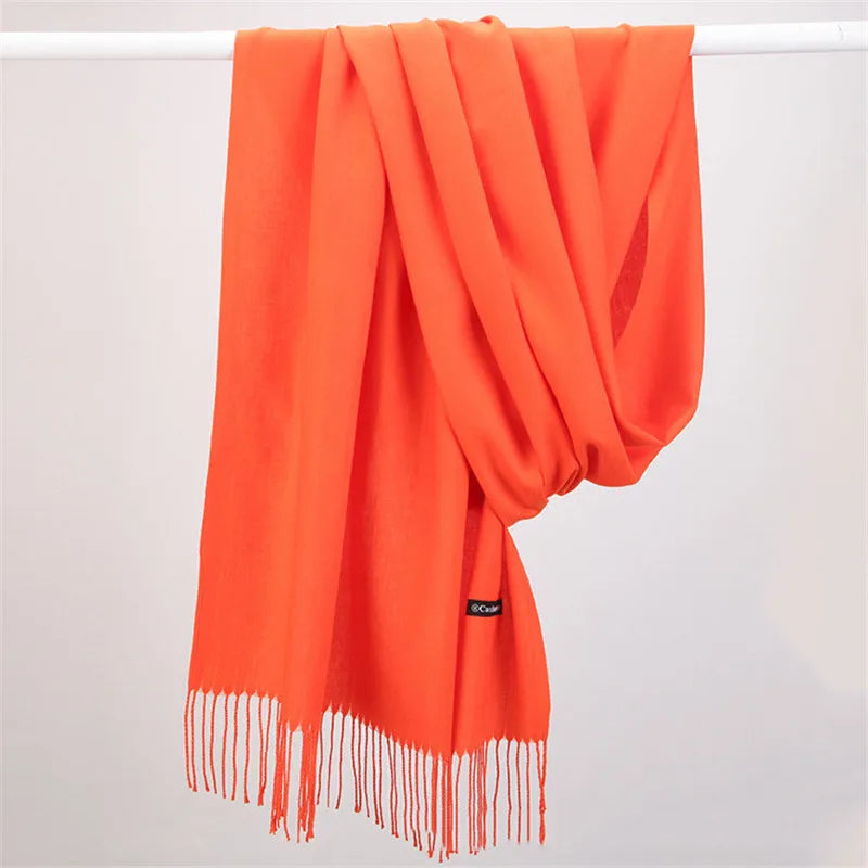 Stylish women's cashmere scarf, an elegant and warm fashion accessory for winter.