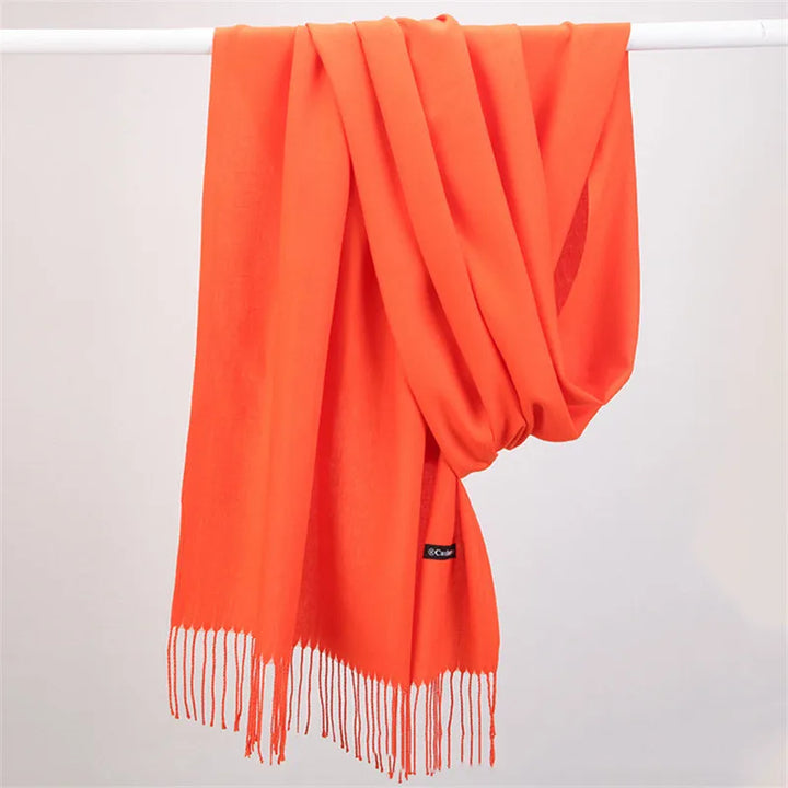 Stylish women's cashmere scarf, an elegant and warm fashion accessory for winter.