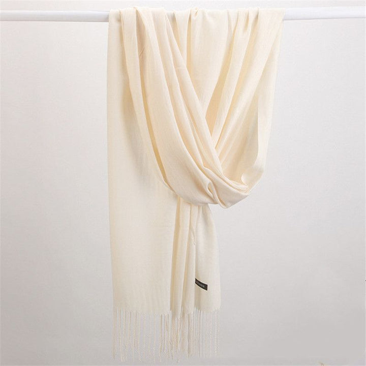 Soft touch Faith cashmere scarf, providing luxurious warmth for women's winter style.