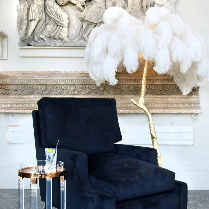 Luxurious Ostrich Feather Floor Lamp with cascading feathers, polished brass finish, and resin base for elegant home lighting