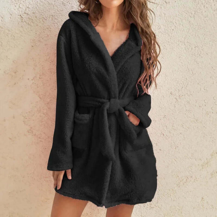 Luxurious plush hooded bathrobe for women. Super soft & warm comfort wear, ideal for lounging.