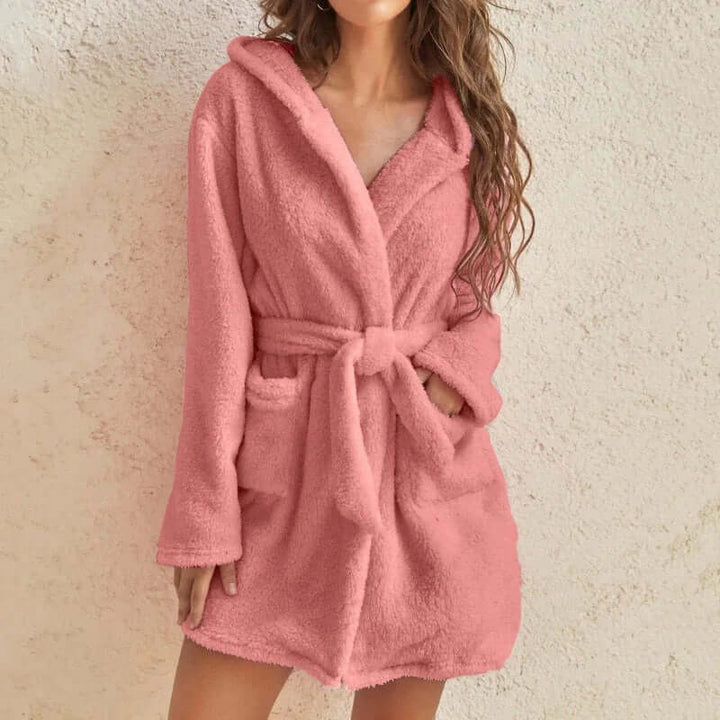 Cozy fleece hooded bathrobe for women. Provides ultimate warmth & comfort, perfect plush loungewear.