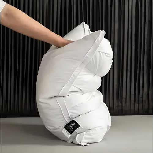 Unisex luxurious goose down pillow ensures ultimate sleep comfort. Hypoallergenic, perfect for home bedding & neck support.