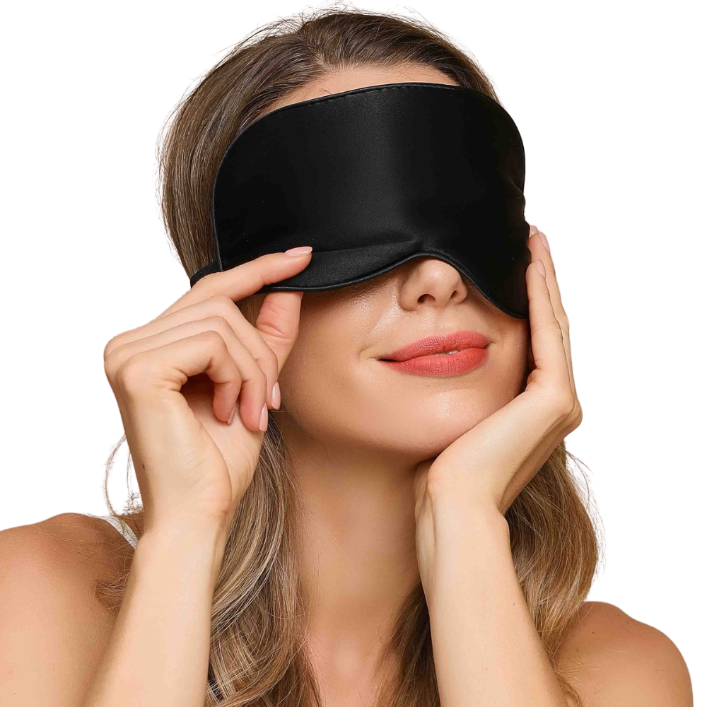 Luxurious unisex silk sleep mask, blocks 100% light; shown in elegant black with adjustable strap for comfortable wear.