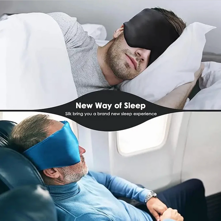 Luxurious unisex silk sleep mask, blocks 100% light; shown in elegant black with adjustable strap for comfortable wear.
