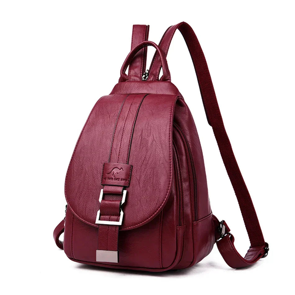 Organized anti-theft women's leather backpack interior, secure pockets for travel essentials.
