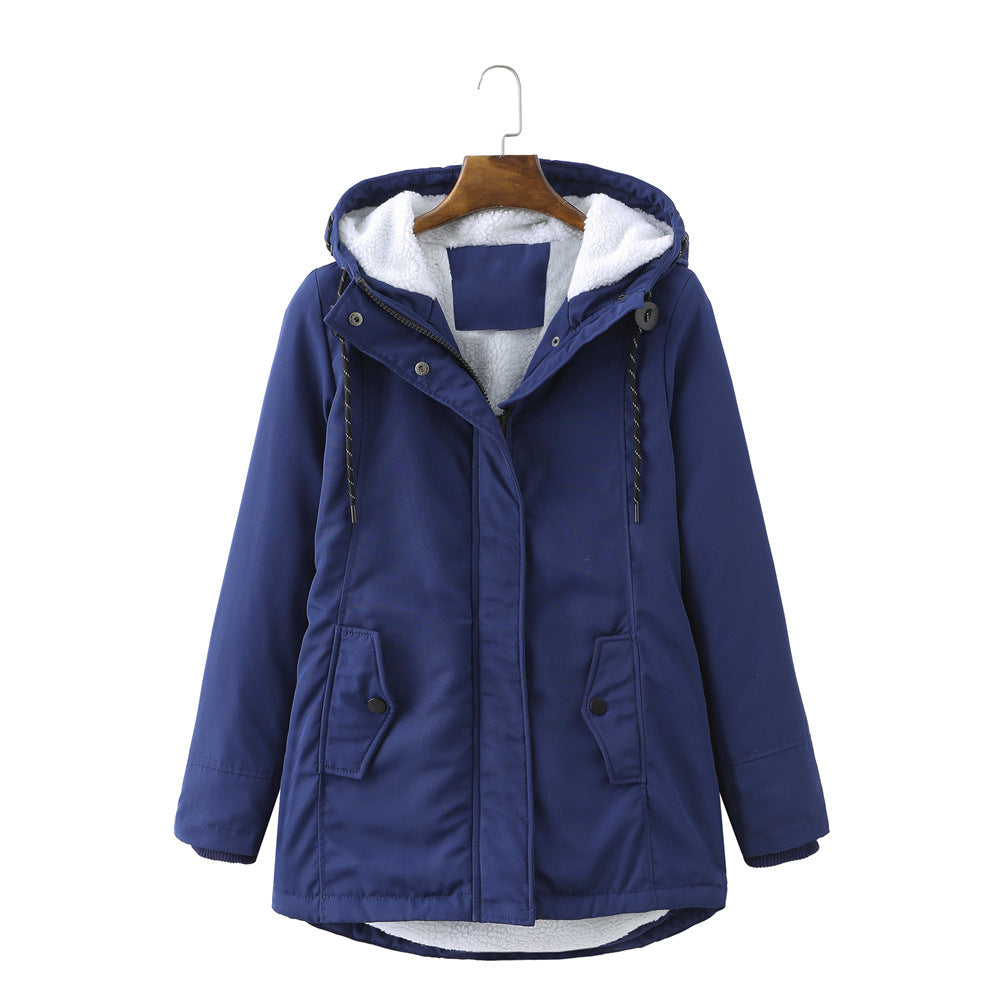 Cozy women's winter parka, luxurious and warm, with a flattering fit for stylish cold weather fashion.