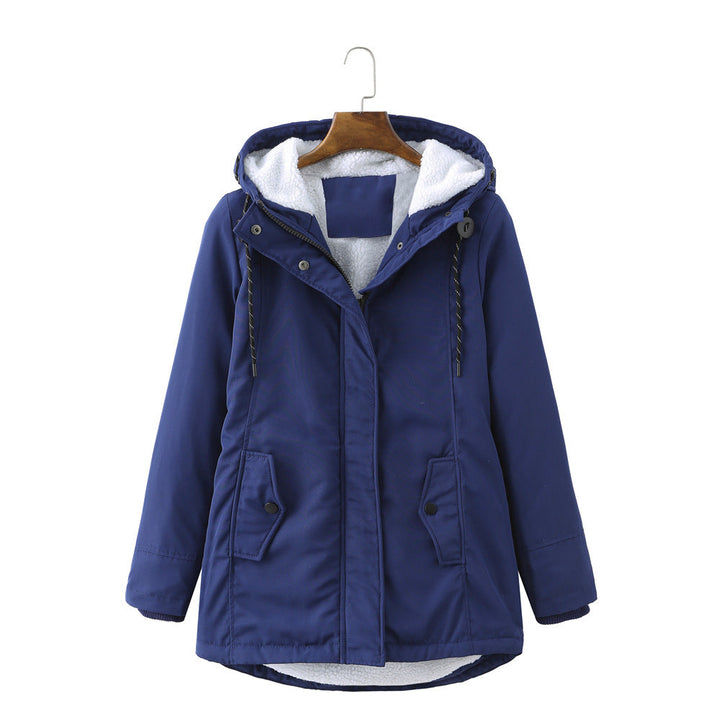 Cozy women's winter parka, luxurious and warm, with a flattering fit for stylish cold weather fashion.