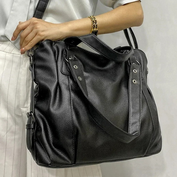 EliteCarry women's chic leather shoulder bag, a fashionable handbag with ample storage for daily and work use.