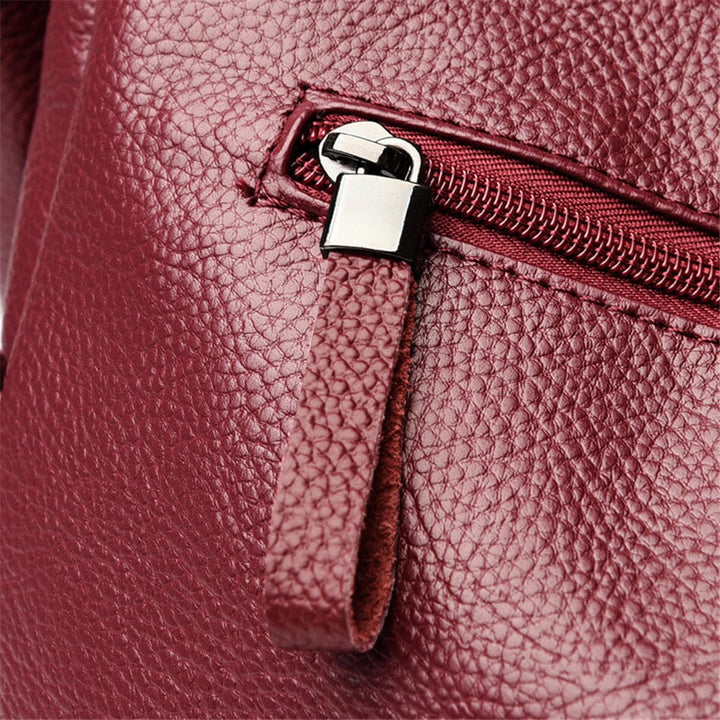 Stunning multi-color women's luxury leather handbag, a statement piece for the modern woman.