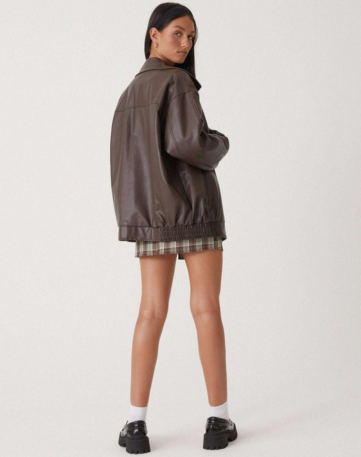 Elegant women's chocolate brown luxury leather jacket, perfect for adding a chic, casual touch to any outfit.