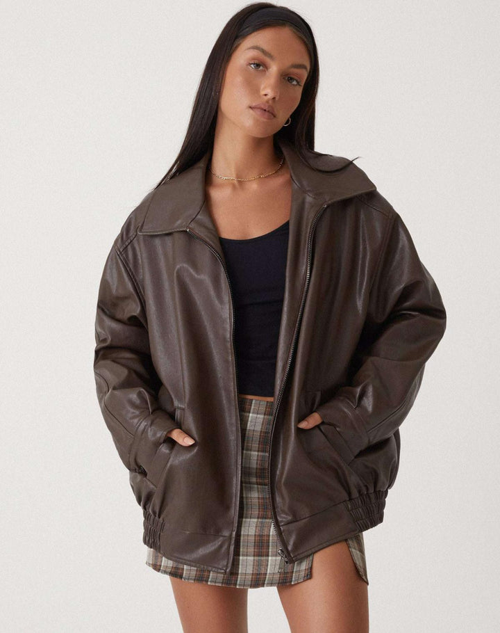 High-quality women's oversized leather jacket in chocolate brown, showcasing its soft texture and luxurious finish.