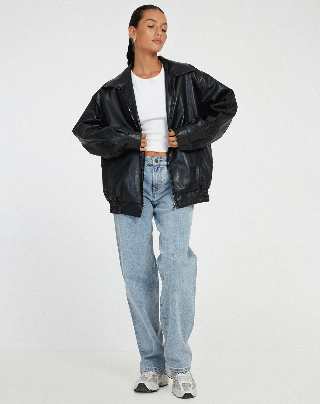 Versatile women's chocolate brown oversized jacket, a luxurious and modern leather outerwear piece for seasons.