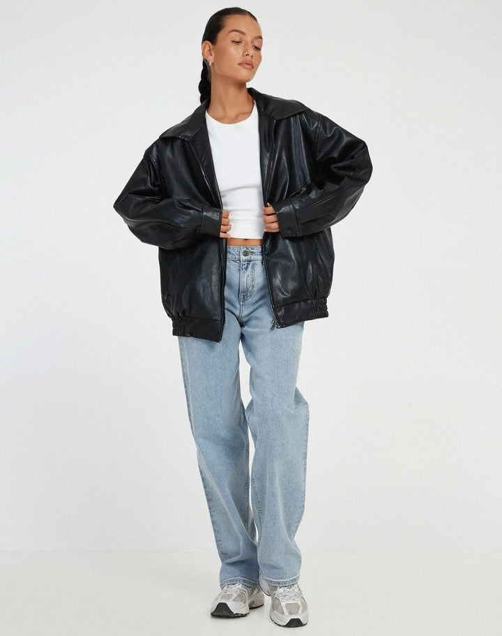 Versatile women's chocolate brown oversized jacket, a luxurious and modern leather outerwear piece for seasons.