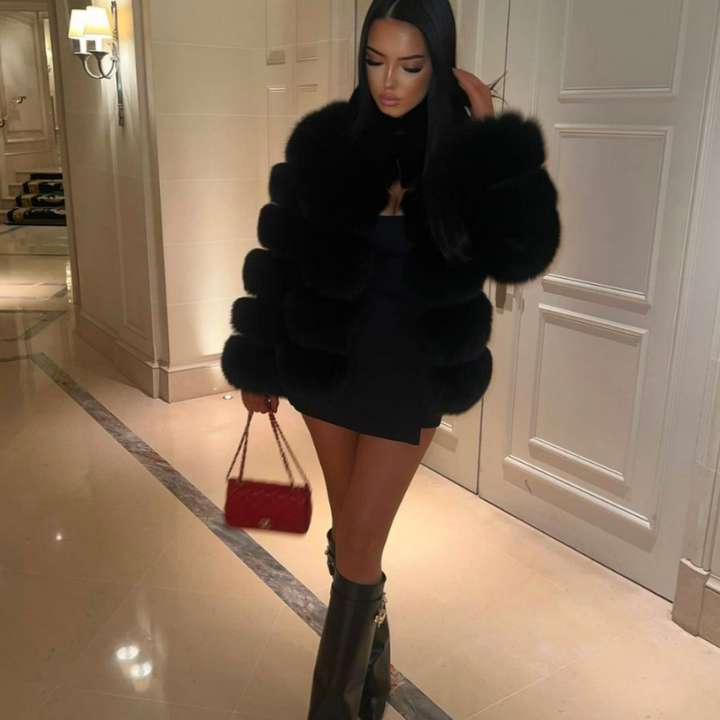 Statement women's plush winter jacket, a chic and cozy outerwear item with a luxurious feel for warmth.